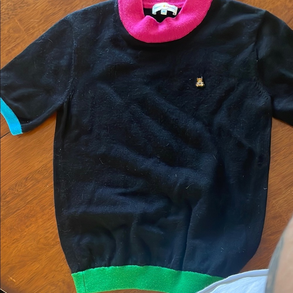 Black Sweater with Pink and Green Accents